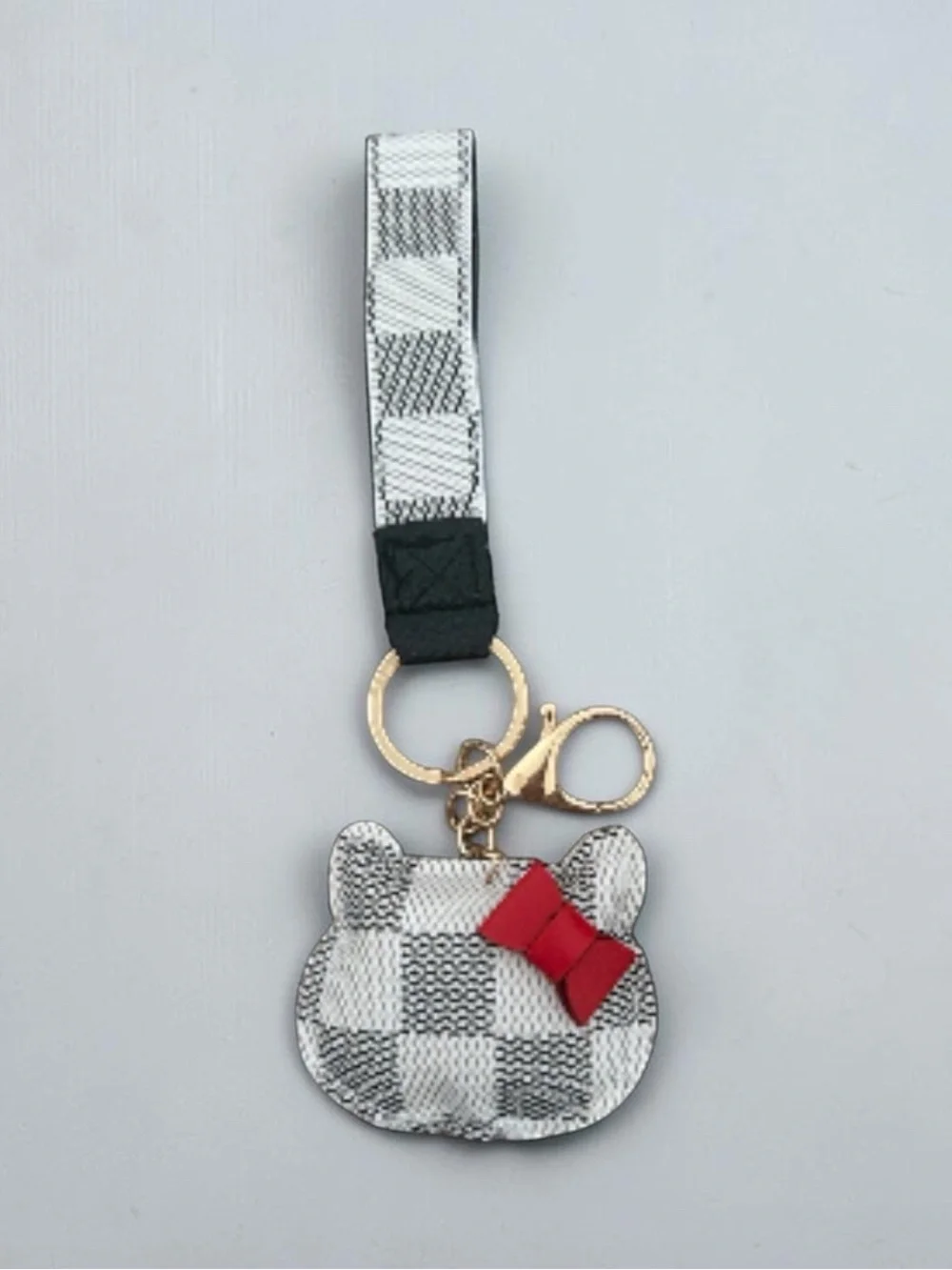Checkered hello kitty charm wristlet